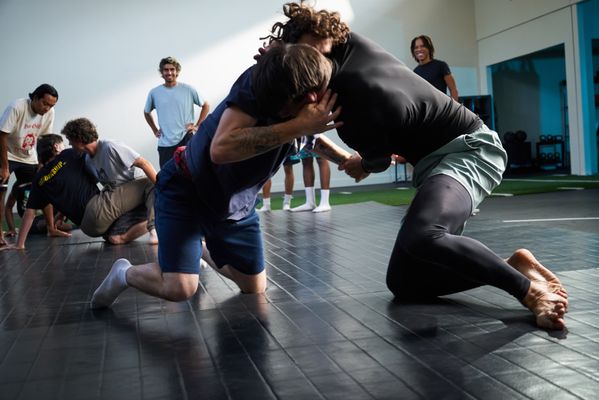 BJJ Gi & No-Gi - Kaizen Academy is a boutique Brazilian Jiu Jitsu school at 2014 Lincoln Blvd in Venice, CA. We offer beginner-friendly adult and kids BJJ classes six days a week, led by a black belt instructor every single session.
We are proudly affiliated with the 360 Brazilian Jiu-Jitsu network — one of the most respected BJJ affiliation families in the country. That affiliation connects our students to a global community of practitioners who share the same values of technical excellence and personal growth.
The word kaizen (改善) is a Japanese philosophy meaning an approach to life that focuses on small, consistent improvements over time — compounding into something remarkable. That's not just our name. It's how we run every class, how we design our curriculum, and how we think about each student's development.
We don't measure success by trophies. We measure it by how much better you are than you were last month. BJJ Gi & No-Gi - Kaizen Academy is a boutique Brazilian Jiu Jitsu school at 2014 Lincoln Blvd in Venice, CA. We offer beginner-friendly adult and kids BJJ classes six days a week, led by a black belt instructor every single session.
We are proudly affiliated with the 360 Brazilian Jiu-Jitsu network — one of the most respected BJJ affiliation families in the country. That affiliation connects our students to a global community of practitioners who share the same values of technical excellence and personal growth.
The word kaizen (改善) is a Japanese philosophy meaning an approach to life that focuses on small, consistent improvements over time — compounding into something remarkable. That's not just our name. It's how we run every class, how we design our curriculum, and how we think about each student's development.
We don't measure success by trophies. We measure it by how much better you are than you were last month.
