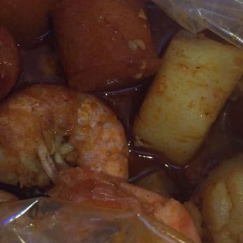 Stinkin Crawfish - Tiger shrimp with scallops in the Stinkin Special flavor with Louisiana sausages. - Cajun/Creole Near Me - Downey, California Stinkin Crawfish - Tiger shrimp with scallops in the Stinkin Special flavor with Louisiana sausages. - Cajun/Creole Near Me - Downey, California