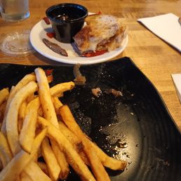 Prime rib grilled cheese sandwich and fries Prime rib grilled cheese sandwich and fries