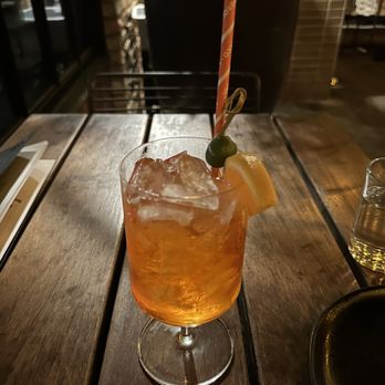 Il Brutto - Orange cocktail. Mostly ice and will run you $16 - Italian Near Me - Austin, Texas