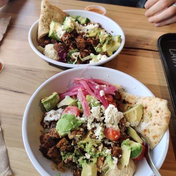 CAVA - Grilled chicken and brown rice bowl with warm pita - Mediterranean Near Me - Cedar Park, Texas