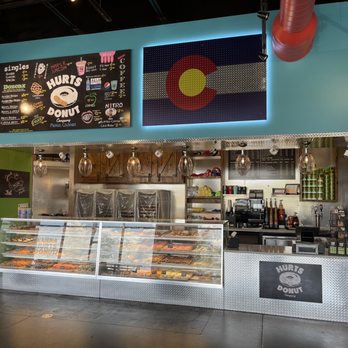 Hurts Donut Co - Interior with their main display case of donuts - Donuts Near Me - Parker, Colorado Hurts Donut Co - Interior with their main display case of donuts - Donuts Near Me - Parker, Colorado