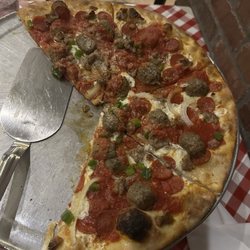 The Don style pizza with added onions and green peppers
