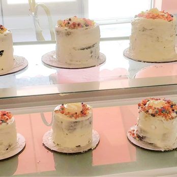 Heidi’s Cupcakery - a row of cakes with frosting and sprinkles - Bakeries Near Me - Live Oak, Florida Heidi’s Cupcakery - a row of cakes with frosting and sprinkles - Bakeries Near Me - Live Oak, Florida