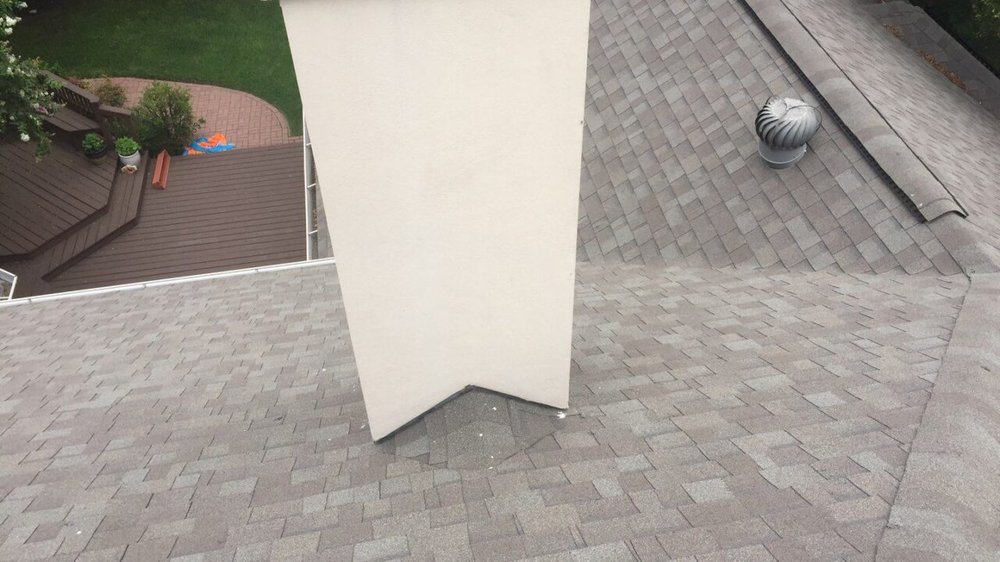 Slide of NSL Roofing Solutions