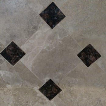 Granite Solutions - Close up of our back splash granite accent tiles.  Alin recommended this design piece and it's a small piece of detail that everyone loves - General Contractors Near Me - Phoenix, Arizona