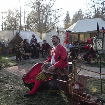 Nottingham Festival - German encampment with a kind gentleman playing a hurdy gurdy for the visitors - Festivals Near Me - Simi Valley, California Nottingham Festival - German encampment with a kind gentleman playing a hurdy gurdy for the visitors - Festivals Near Me - Simi Valley, California