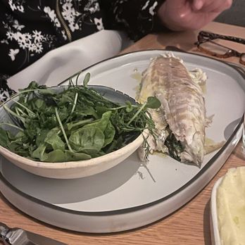 Francine - Well presented Branzino in a flaming crust with side salad. Simple and delicious. - French Near Me - Scottsdale, Arizona Francine - Well presented Branzino in a flaming crust with side salad. Simple and delicious. - French Near Me - Scottsdale, Arizona