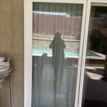 Dreamstyle Remodeling - The entire door is shattered but still in place. - General Contractors Near Me - Albuquerque, New Mexico