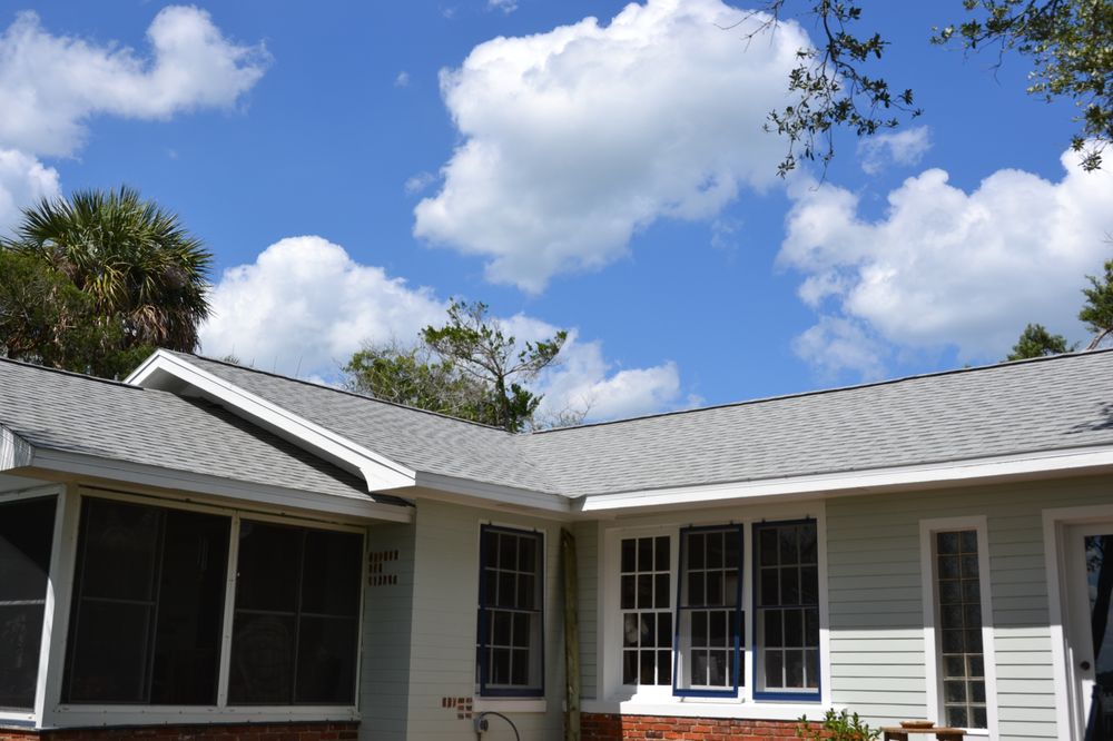 Slide of River City Roofing