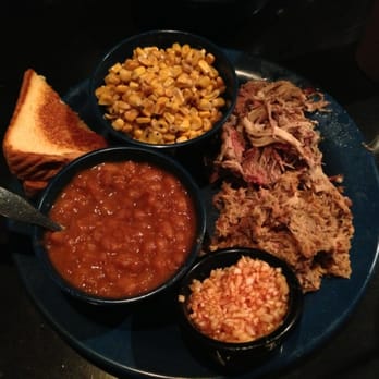 Mojo Old City BBQ - 2 meat platter: pulled pork and North Carolina pork w/ baked beans and corn on the side - Barbeque Near Me - St. Augustine, Florida