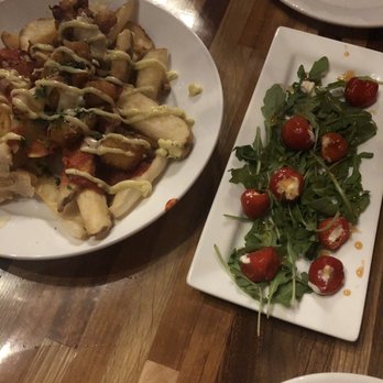 Capone’s Speakeasy & Restaurant - Poutine and stuffed pepadew peppers. These were both delicious - Pizza Near Me - Muskegon, Michigan Capone’s Speakeasy & Restaurant - Poutine and stuffed pepadew peppers. These were both delicious - Pizza Near Me - Muskegon, Michigan