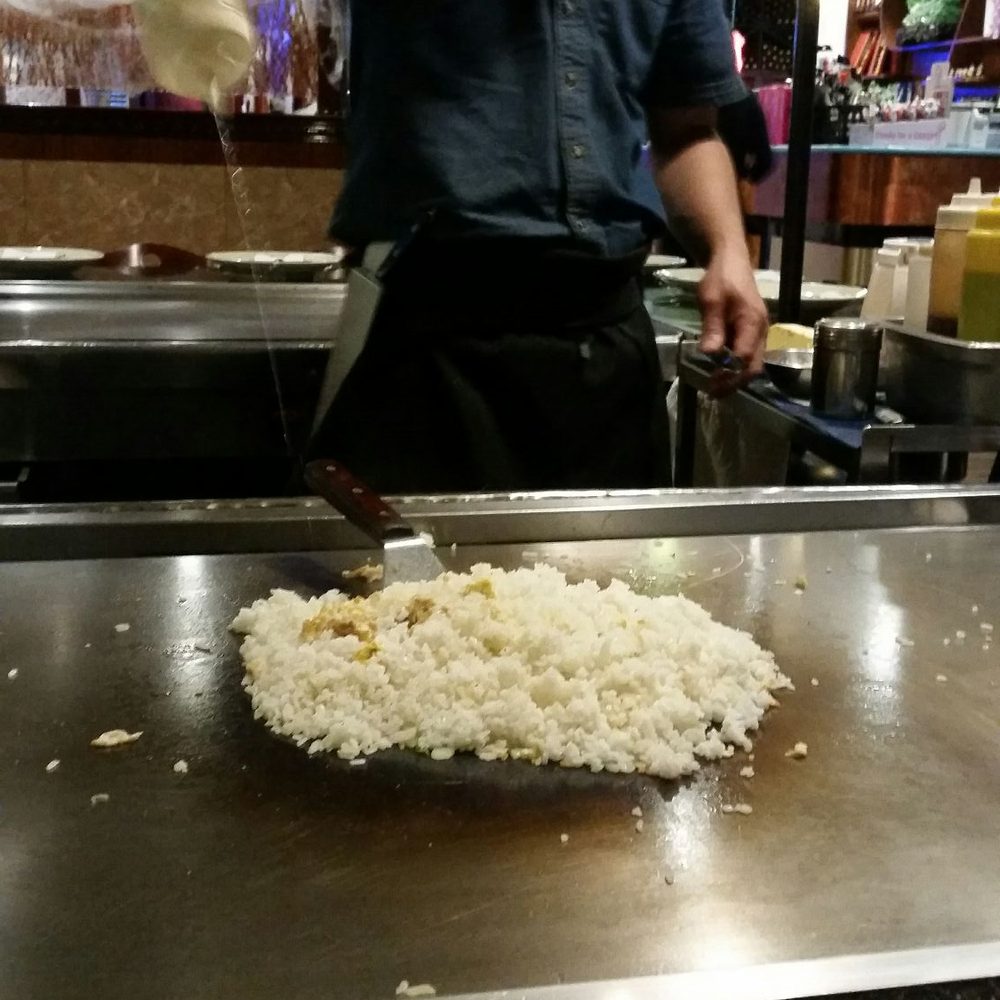 Fuji Grill - Beginning pile of rice, right before the sake squirt into our mouths - Japanese Near Me - Buffalo, New York