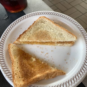 Waffle House - a half eaten sandwich on a paper plate - Breakfast & Brunch Near Me - Cocoa Beach, Florida