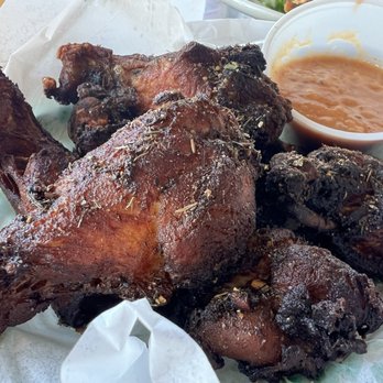 Sundancer Grill - Jerk Spicy Island Wings. Might be better with ranch, the sauce doesn't stick much. Good flavor, a bit dry. - American Near Me - Lakeway, Texas Sundancer Grill - Jerk Spicy Island Wings. Might be better with ranch, the sauce doesn't stick much. Good flavor, a bit dry. - American Near Me - Lakeway, Texas