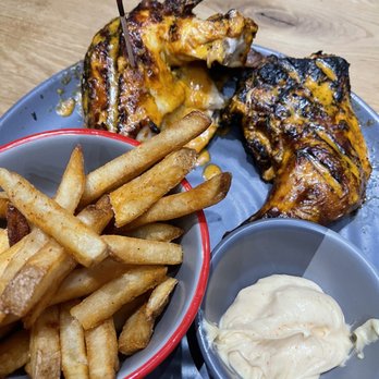 Nando's Peri-Peri - Half-Chicken Combo with peri-peri fries. - Chicken Shop Near Me - Chicago, Illinois Nando's Peri-Peri - Half-Chicken Combo with peri-peri fries. - Chicken Shop Near Me - Chicago, Illinois