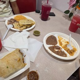 Pastor burrito. Pastor quesadilla. Rice and beans. Watermelon and dragon fruit juice.