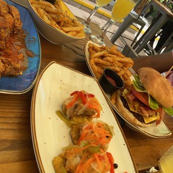 Dukunoo - Jamaican Jerk Bacon Burger and Pressed Plantain Bites Plate - Caribbean Near Me - Miami, Florida Dukunoo - Jamaican Jerk Bacon Burger and Pressed Plantain Bites Plate - Caribbean Near Me - Miami, Florida
