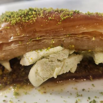 Truva Turkish Kitchen - Baklava with ice cream yummy - Turkish Near Me - Charlotte, North Carolina Truva Turkish Kitchen - Baklava with ice cream yummy - Turkish Near Me - Charlotte, North Carolina