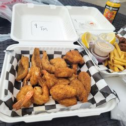 Keeper's Fish Shack - This is $50 worth of food supposed to feed 2 with supposed to be 2 of every type of fish on the menu. Moat pieces were nugget sized
