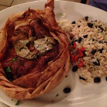 Sin Fronteras Cafe - The baked chicken with dirty rice. One of the feat dishes here. - Latin American Near Me - Annapolis, Maryland Sin Fronteras Cafe - The baked chicken with dirty rice. One of the feat dishes here. - Latin American Near Me - Annapolis, Maryland