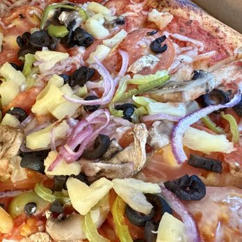 Pizza Madness - This is our beautiful, delicious, vegan pizza. I couldn't get a shot of the whole thing, because we had already dug in before I remembered. - Pizza Near Me - Canon City, Colorado Pizza Madness - This is our beautiful, delicious, vegan pizza. I couldn't get a shot of the whole thing, because we had already dug in before I remembered. - Pizza Near Me - Canon City, Colorado