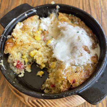 Panxa Cocina - Green chili corn bread. It came hot in this small skillet. Melted butter over corn bread. Yum!!! - Cocktail Bars Near Me - Long Beach, California