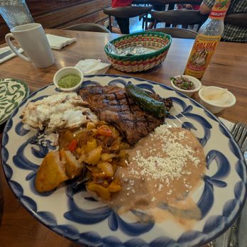 Girasol Cocina Mexicana - Ribeye plate w/ beans, tatoes and creamy paloma chiliaquiles - Mexican Near Me - Monrovia, California Girasol Cocina Mexicana - Ribeye plate w/ beans, tatoes and creamy paloma chiliaquiles - Mexican Near Me - Monrovia, California