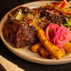 Azucar Cuban Restaurant - Masas - Fried Duroc Pork Chunks, Moro Rice, Yuca Fries, Mojo