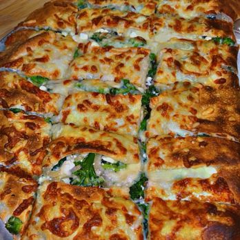Steve's Pizza - Spinach, Feta and Garlic Calzone - Pizza Near Me - Waltham, Massachusetts Steve's Pizza - Spinach, Feta and Garlic Calzone - Pizza Near Me - Waltham, Massachusetts