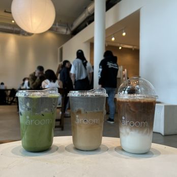 Aroom Coffee - left: sesame matcha latte middle: sesame latte right: coconut coffee - Coffee & Tea Near Me - Seattle, Washington Aroom Coffee - left: sesame matcha latte middle: sesame latte right: coconut coffee - Coffee & Tea Near Me - Seattle, Washington