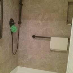A shower in a one-bedroom room