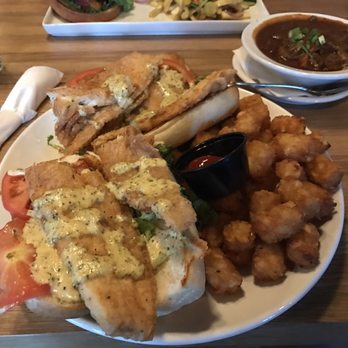 Waterman's Brewing - Flounder Po Boy with tots. - Brewpubs Near Me - Wilmington, North Carolina