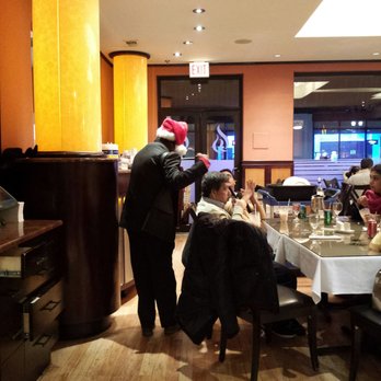 Sabri Nihari Restaurant - Indian Santa with an accordion, the second time I've encountered this in one week. - Pakistani Near Me - Chicago, Illinois