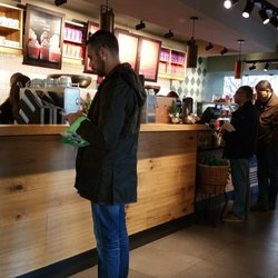 Starbucks - Front Counter at Starbucks Rue du Mont Blanc