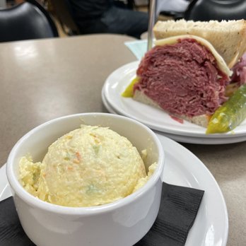 Slyman's Restaurant - This is as Mike high Corn Beef with a side of potato salad. Let's dig in!!! - American Near Me - Cleveland, Ohio Slyman's Restaurant - This is as Mike high Corn Beef with a side of potato salad. Let's dig in!!! - American Near Me - Cleveland, Ohio