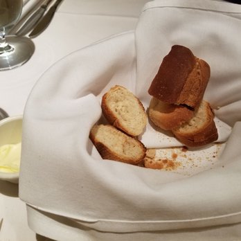 Tavira Restaurant - Burned bread given a minute before entrees. - Mediterranean Near Me - Chevy Chase, Maryland