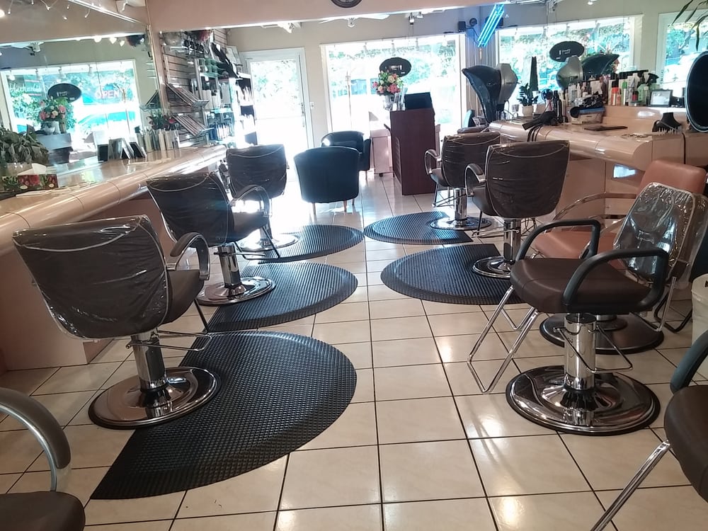 Haircuts by Angie Singh Logo
