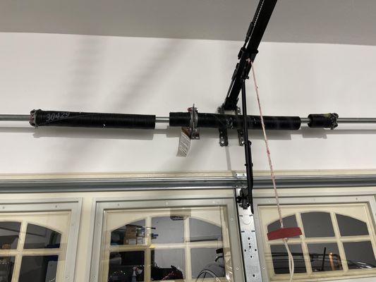 Torsion Spring Replacements - When both springs break don't use you opener. The springs are the muscle of your garage door and carry all the weight of the door. The opener is not to carry any weight, if it is carrying weight, that weight will damage the internal parts. Give us a call today and ensure that your door system is functioning properly!