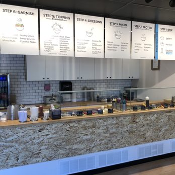 Island Poké - a counter with a variety of items on it - Poke Near Me - Victoria, British Columbia