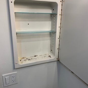 Bali Hai Beach Resort - This is a shelf in the bathroom, the shelf is rusty and doesn't look healthy - Hotels Near Me - Holmes Beach, Florida Bali Hai Beach Resort - This is a shelf in the bathroom, the shelf is rusty and doesn't look healthy - Hotels Near Me - Holmes Beach, Florida