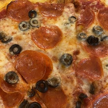 Giovanni's Pizza & Pasta - Pepperoni and black olives - Italian Near Me - Flagler Beach, Florida Giovanni's Pizza & Pasta - Pepperoni and black olives - Italian Near Me - Flagler Beach, Florida