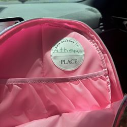 The Children's Place - The returned backpack that the store sold me with another child's name inside the backpack.