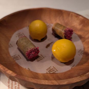 Tiya - Last course. Dessert mouth freshner bites. Paan beetle leave roll ups and mango shrikand balls - Indian Near Me - San Francisco, California Tiya - Last course. Dessert mouth freshner bites. Paan beetle leave roll ups and mango shrikand balls - Indian Near Me - San Francisco, California