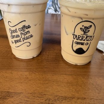 Tarrazu Coffee Co - Coquito latte on the left and iced cafe bombon on the right - Coffee & Tea Near Me - Coconut Creek, Florida Tarrazu Coffee Co - Coquito latte on the left and iced cafe bombon on the right - Coffee & Tea Near Me - Coconut Creek, Florida