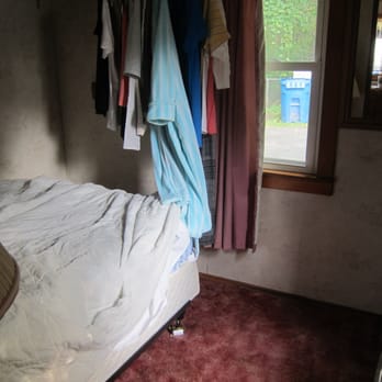 Palmer Lake Lodges - Bedroom #1 with double bed and dresser (and lots of cobwebs) - Hotels Near Me - Colon, Michigan Palmer Lake Lodges - Bedroom #1 with double bed and dresser (and lots of cobwebs) - Hotels Near Me - Colon, Michigan