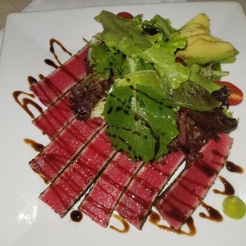 Fig's Prime - Fig's Prime- Sliced Ahi Tuna - pepper-crusted and pan-seared, with avocado and balsamic reduction over mixed greens - $14 - Steakhouses Near Me - Altamonte Springs, Florida Fig's Prime - Fig's Prime- Sliced Ahi Tuna - pepper-crusted and pan-seared, with avocado and balsamic reduction over mixed greens - $14 - Steakhouses Near Me - Altamonte Springs, Florida