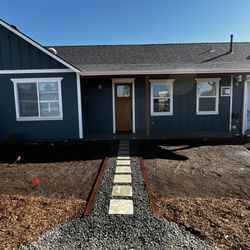 Paradise Landscapes - Front view walkway before grass