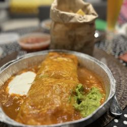 Mi Casa Restaurante Mexicano - Shrimp burrito including chips and salsa.
