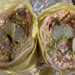 Taqueria San Miguel & Carniceria - 805 Breakfast burrito (eggs, potatoes, beans, cheese, bacon, house-made guacamole) mm mm good